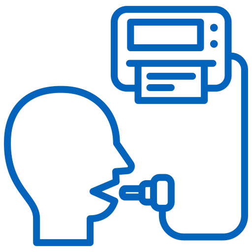 A person using a breathalyzer device.